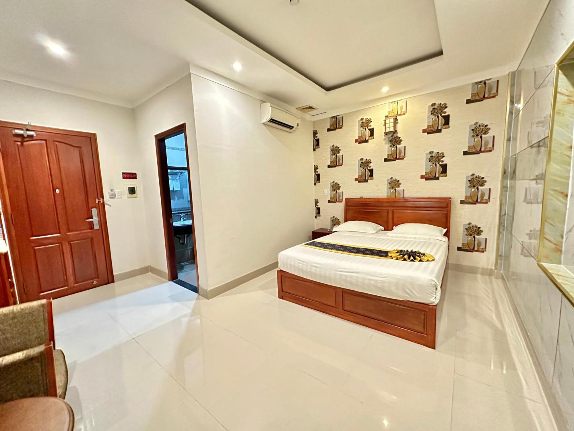 Long Bao Chau Hotel Thu Dau Mot Екстер'єр фото